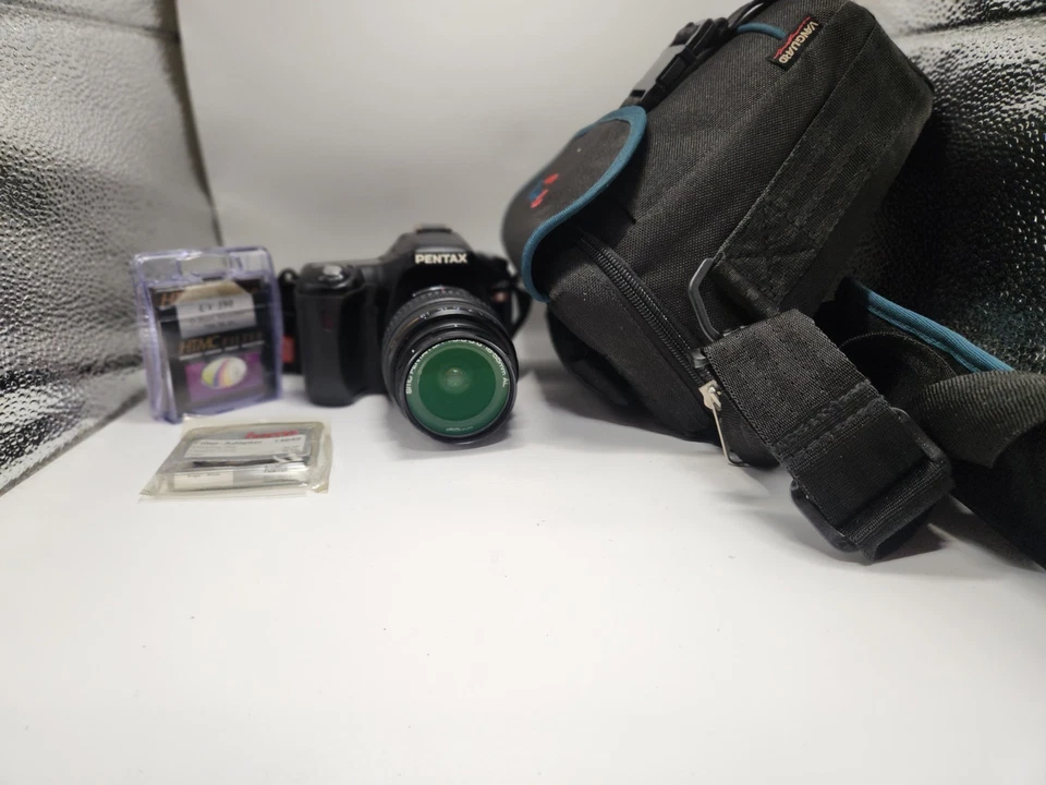 Pentax *ist D L digital camera Kit with Pentax 18-55mm auto-focus zoom lens.