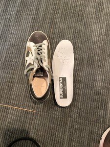 golden goose superstar on feet