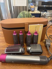 Dyson Airwrap wand with accesories and case