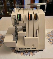 Singer 14U132 Overlocker Sewing Machine with Foot Pedal and Threads