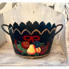 Vintage oval black metal footed tole basket with painted fruit and gold trim