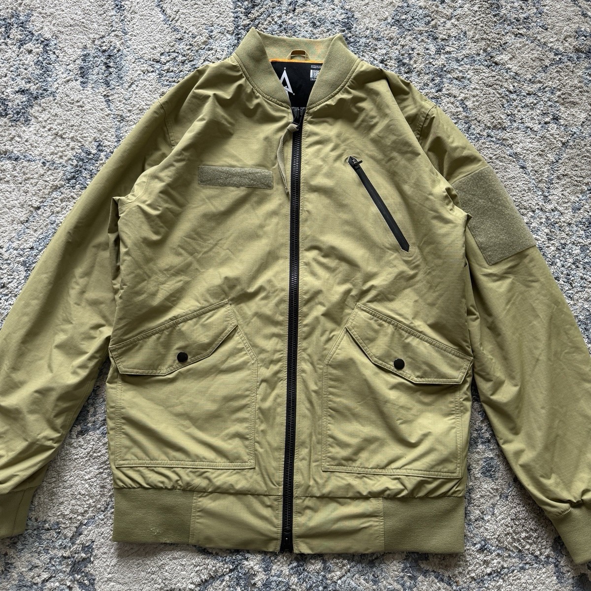 UNDEFEATED Alpha Industries Burton MA-1 Flight Bomber Jacket Tan