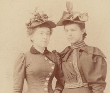 PORTRAIT OF SISTERS IN BEAUTIFUL HATS   DRESSES