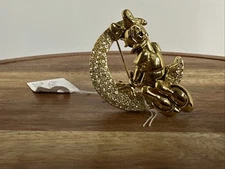 Vintage Daisy Duck Disney  sitting on a cresent moon