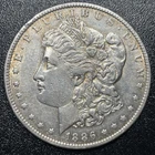 1886-O Morgan Silver Dollar $1 AU About Uncirculated