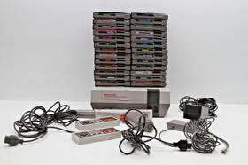 Nintendo NES Console, 2 Controllers, Zapper Gun, 26 Games w Sleeves & Manuals