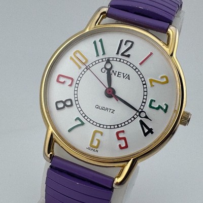 VTG Geneva Quartz Watch Unisex Gold Tone Color Markers Stretch Analog New Batter