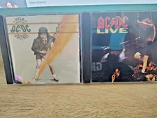 AC/DC Set of 2 Live and High Voltage CD's Gently Used Hard Rock