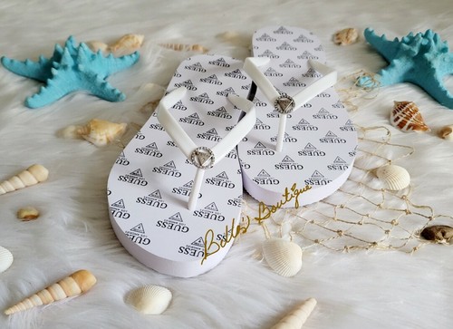 guess thongs with bow