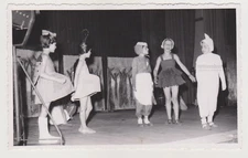 Adorable School Play Little Girls in Whimsical Costumes Steal the Spotlight Phot