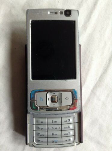 Téléphone coulissant incomplet Nokia N95-1 argent et violet pour pièces ne fonctionne pas - Photo 1/5
