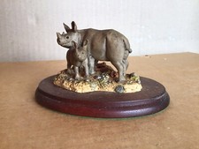 BORDER FINE ARTS     RHINO   AND  CALF  WW 31   1995