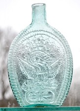 Historical Flask, American Eagle and Stars are on both sides, bluish aqua pint