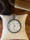 antique Waltham open-face pocket watch, likely dating from the early 1900s