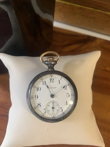 antique Waltham open-face pocket watch, likely dating from the early 1900s