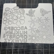 LOT OF CUTTING DIES FLOWERS LEAVES BIRDS WHITE PAGE NOT INCLUDED
