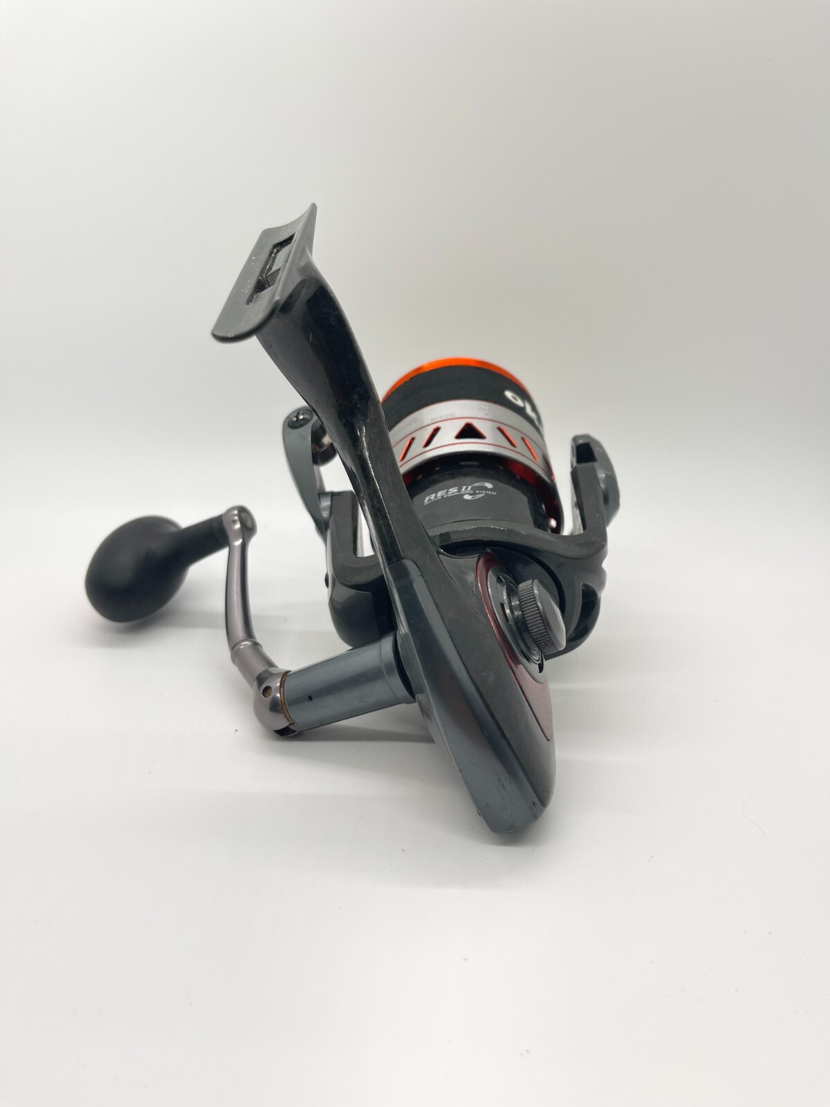 Okuma RTX 55 Spinning Fishing Reel with 30lb Braid