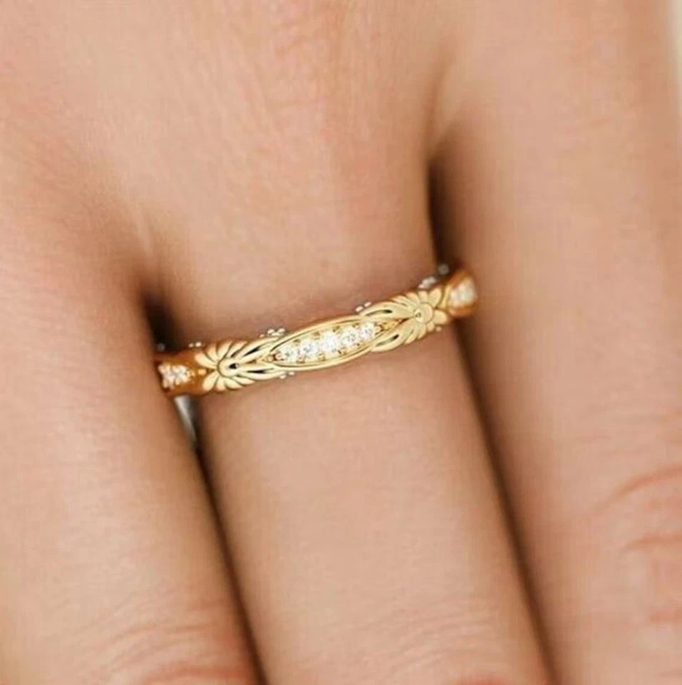 Anillo banda de eternidad completa de diamantes creados en laboratorio redondo de 0,7 quilates chapado en oro de dos tonos de 14 K Foto 2 de 4