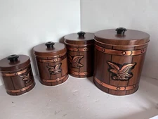 J L Clark 4 Nesting Canisters Metal Eagle Emblem