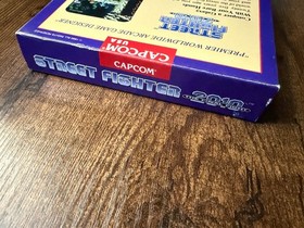 oval seal Street Fighter 2010 complete in box nintendo nes factory nr-MINT