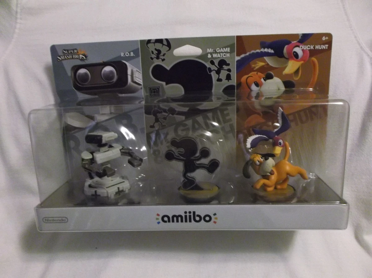 Day 18 of getting every Smash amiibo: R.O.B., Mr. Game & Watch, and Duck  Hunt! Been meaning to get this three pack for a while and when I saw a  listing of