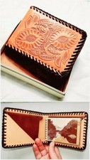 Vintage hand tooled western wallets, brand new without wear. 1960's