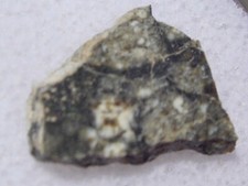 .444 gramos Touat 005 meteorito lunar 12x10x2mm rebanada "la vitral lunar"