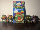 TMNT vintage Talkin Turtles. Loose Complete And Unopened Quip Strip