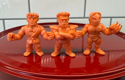 Super7 Nerd Block Orange Street Fighter M.U.S.C.L.E. Figures Ryu, M. Bison, Vega