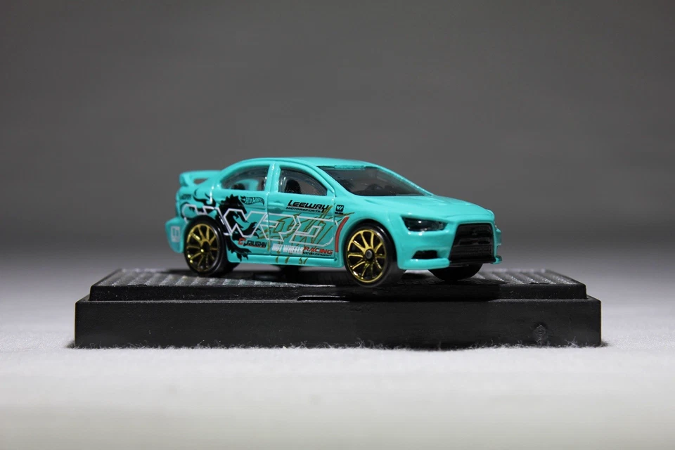 Hot Wheels Tunerz 2008 Mitsubishi Lancer Evolution X verde azulado/turquesa con oro 10 velocidades Foto 3 de 4