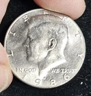 AU 1986-P 50C Kennedy Half Dollar