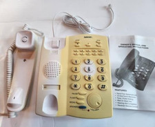 New Sakar Corded Speaker phone one touch emergency  Memory. Yellowing from Sun