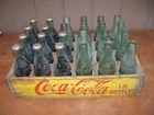 24 VINTAGE 6 AND 6-1/2OZ COCA COLA BOTTLES in Wooden Crate 10 are unopened