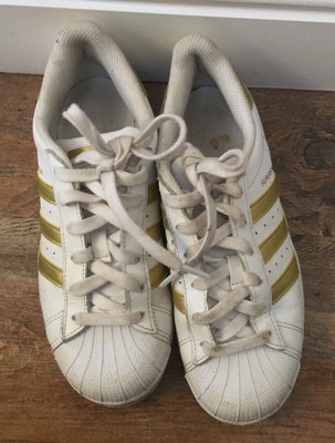 white and gold ladies trainers