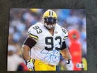 Green Bay Packers GILBERT BROWN Signed 8x10 Photo Beckett Witness BAS Witnessed