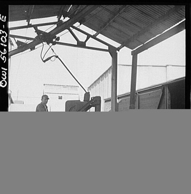 Photo:Industrial Warehouse Interior Worker 1900s Black and White Photo
