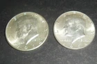 Two !964 Kennedy Hal-Dollars 90% Silver.  See photos for details.