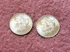 MORGAN SILVER DOLLAR COINS.  LOT OF 2 x UNC.  1884-O .  LOT # 33