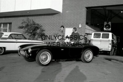 CARROLL SHELBY & STEVE MCQUEEN CHECK OUT AC COBRA CAR PHOTO 12X18 POSTER RACING