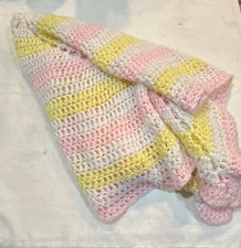 Handmade crocheted baby blanket in pink,white and yellow. Trip around the World