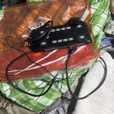 This is a GE UltraPro 8-Outlet Surge Protector with USB charging ports