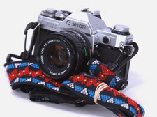 Canon AE-1 35mm SLR Film Camera with Canon 50mm f/1.8 FD Lens - With New Seals