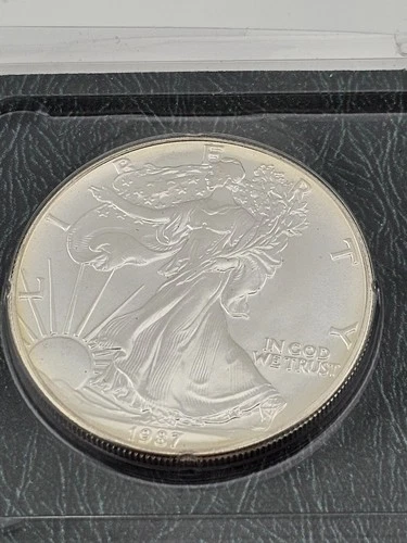 1987 - Silver American Eagle - Uncirculated 1oz  .999 Fine - Littleton Coin Co