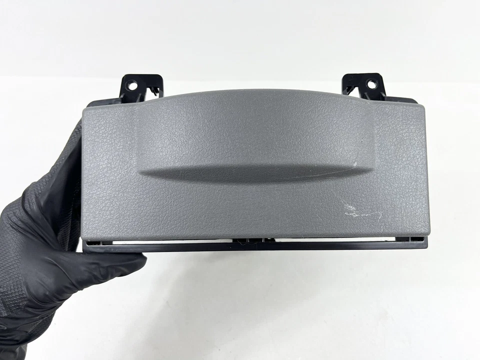 Dodge Caravan Town & Country 2008-2010 consola portavasos deslizante central delantera Foto 2 de 4