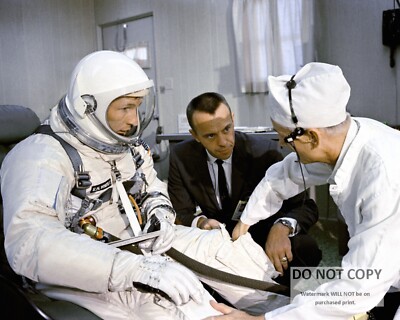 ED WHITE GEMINI 4 ASTRONAUT SUITS UP AS ALAN SHEPARD WATCHES 8X10 PHOTO (AA-516)
