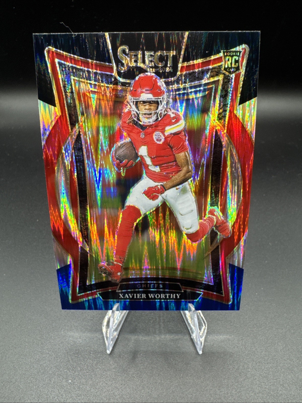 2024 Panini Select - Concourse Xavier Worthy #32 Black & Blue Shock Prizm (RC)