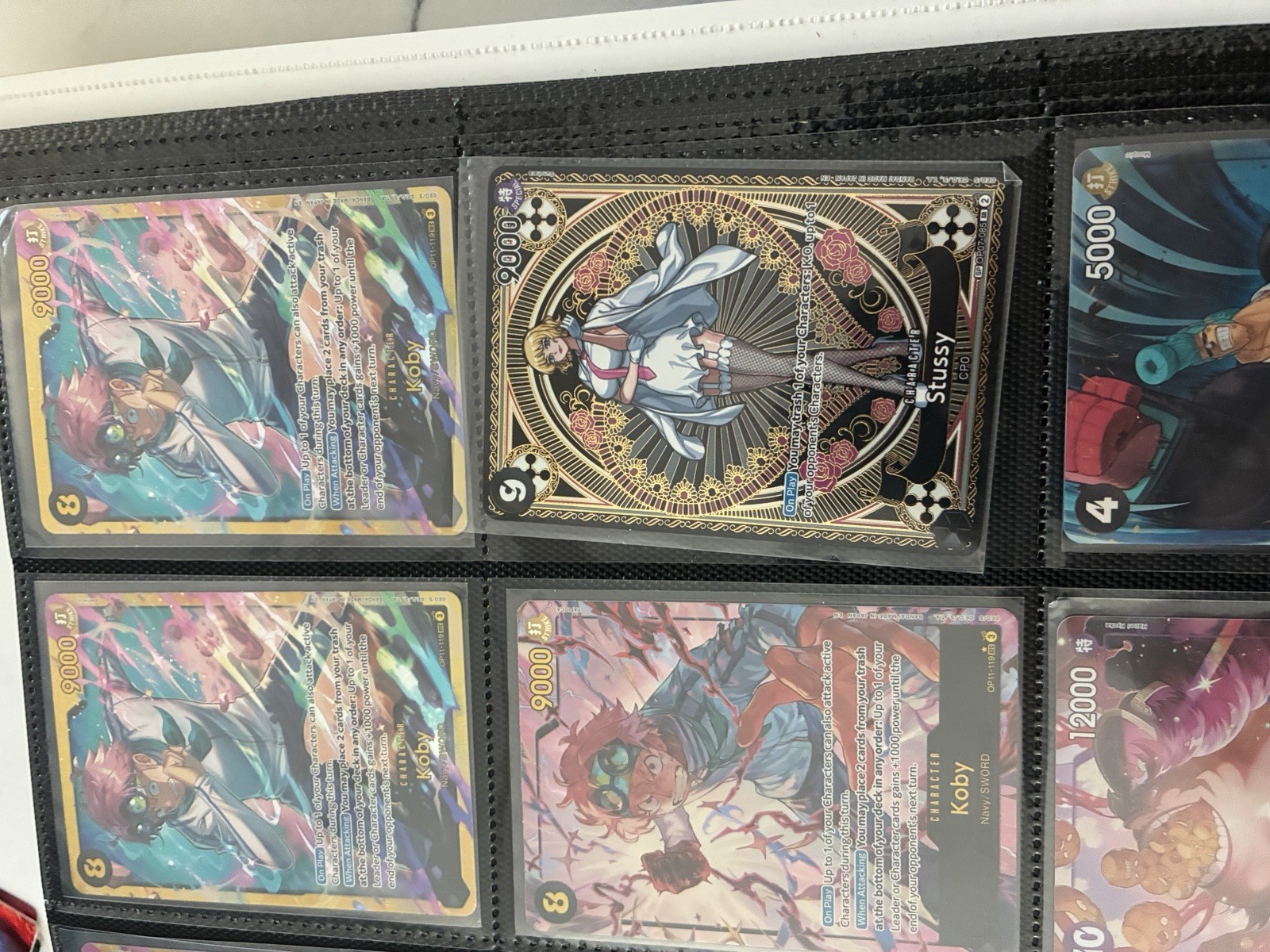 Stussy OP07-085 (One Piece Fist of Divine Speed) — is it worth grading?