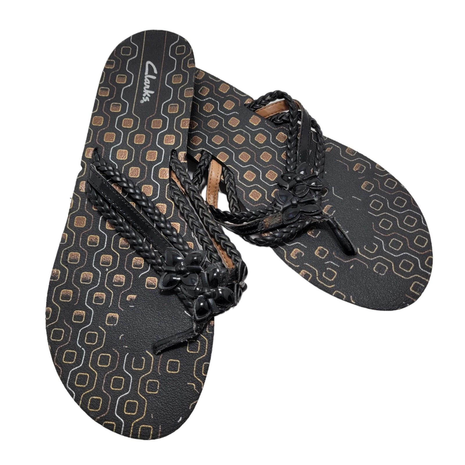 Infradito infradito Clarks da donna nero intrecciato in pelle con perizoma fiore taglia 10M