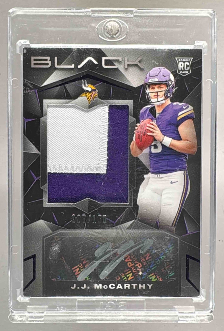 J.J. McCarthy 2024 Panini Black #202 Royal Patch Auto RC /150 Rookie