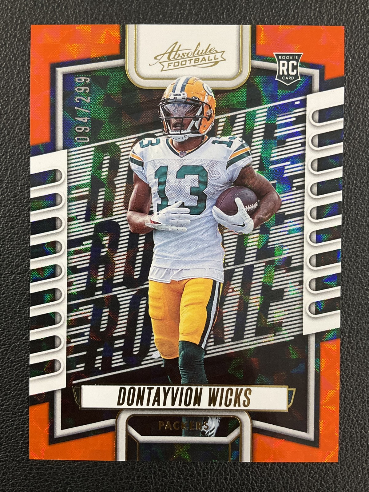 2023 Panini Absolute #199 Dontayvion Wicks Green Bay Orange Mosaic /299